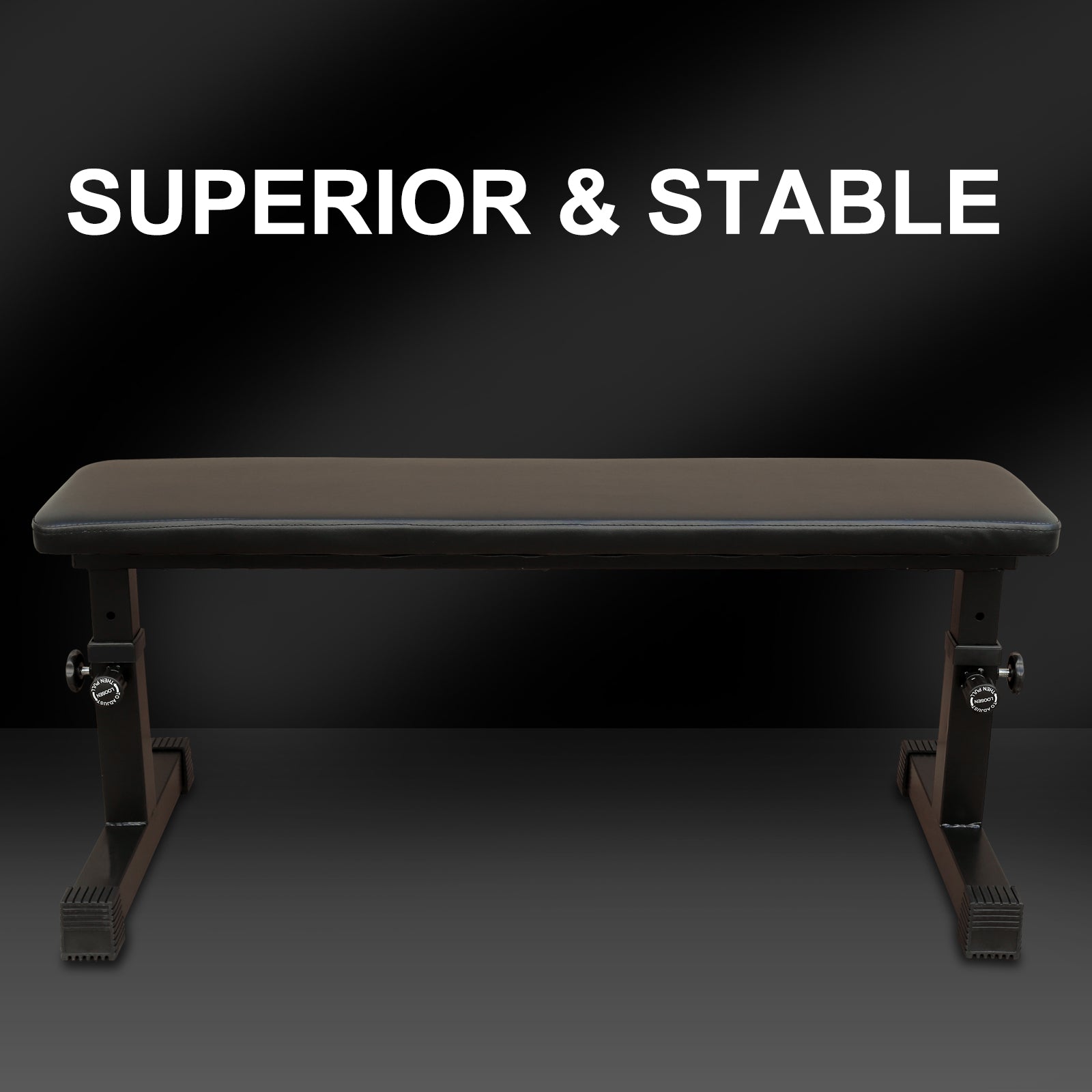Flat weight bench with dark padded top and adjustable steel base, black frame.