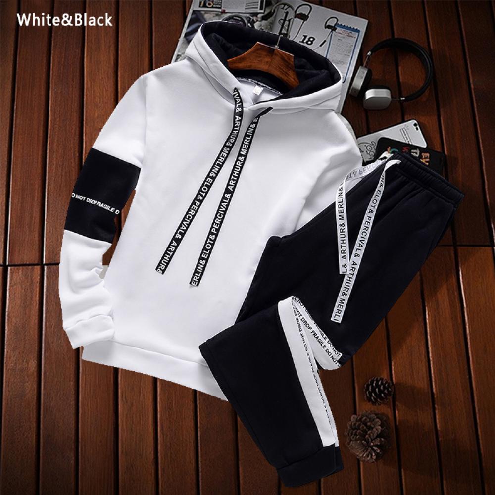 Two-piece hoodie and sweatpants set, white hoodie with black side panels and black joggers