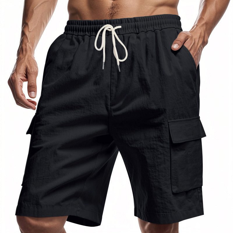 Black men’s drawstring cargo shorts with elastic waistband and side flap pockets