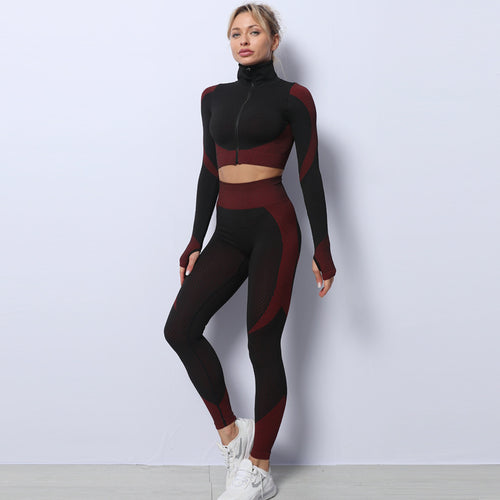 Black seamless 3-piece set with burgundy panels: sports bra, leggings, zip top.